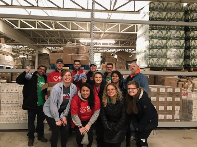 Students and staff volunteering at the Central PA Food Bank. 