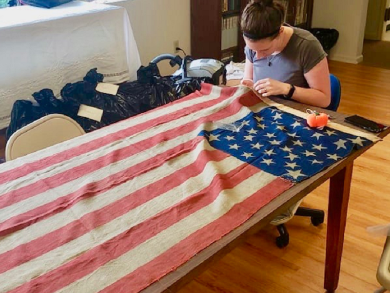 Cijianna Berry ’19-’20M and Dr. Karin Bohleke to restore 100 historic flags